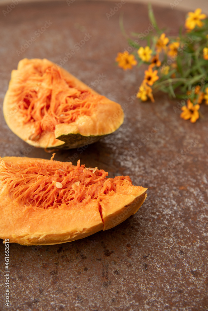 Yellow pumpkins on rustic plate with natural light Yellow pumpkins on rustic plate with natural light