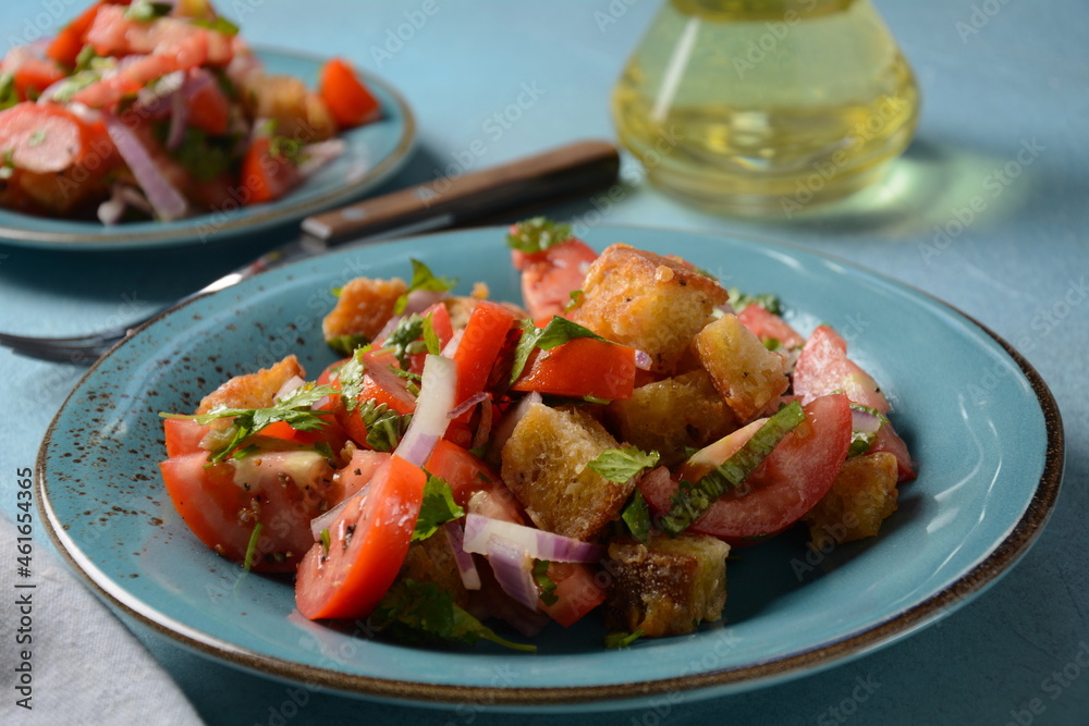Panzanella, traditional Italian salad with tomatoes and bread. Tuscan , Mediterranean healthy food. Panzanella, traditional Italian salad with tomatoes and bread. Tuscan , Mediterranean healthy food.