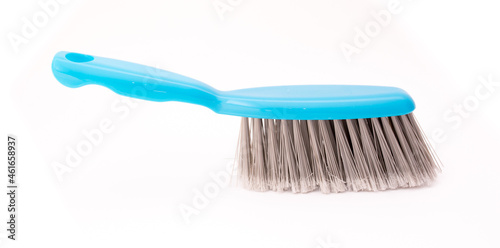 Scoop and brush blue cleaning kit isolated on white background