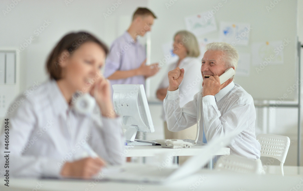 group of people working in office group of people working in office