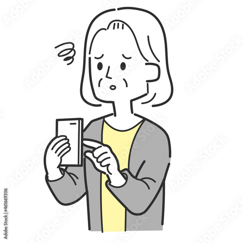 スマホ操作中がっかりした高齢女性