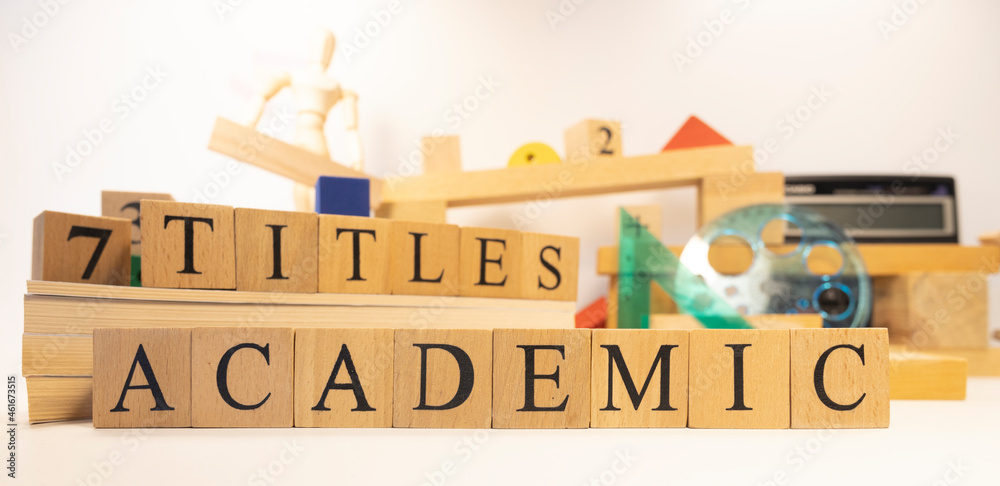 The word Academic titles was created from wooden cubes.
