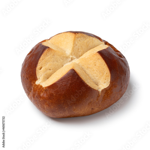 Single fresh baked German Lye roll close up isolated on white background  photo