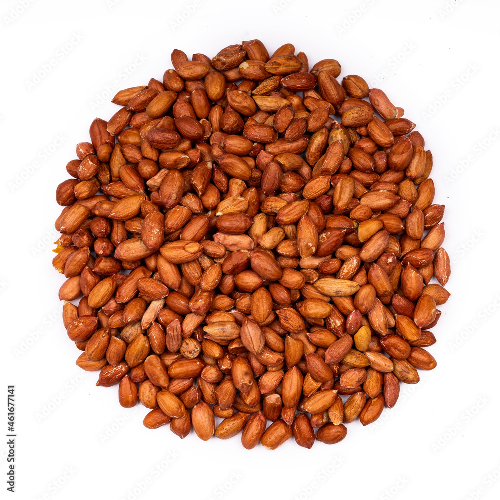 Roasted peanuts on a white isolate. Roasted peanuts on a white isolate.
