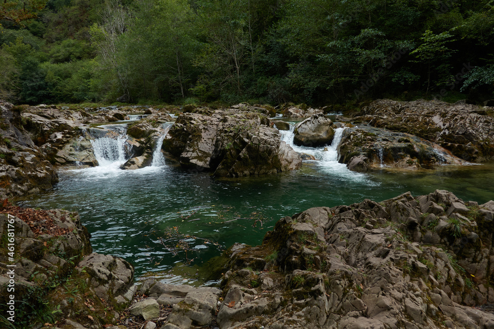 Senda De La Hoya De San Vicente across the Dobra River in the Ponga Natural Park in Asturias. Spain Senda De La Hoya De San Vicente across the Dobra River in the Ponga Natural Park in Asturias. Spain