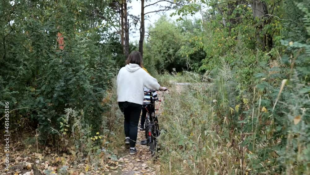 Family bike ride in the park