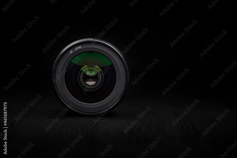 Photography Photo Lens.  Ecstatic photo camera lens in a dark ambience