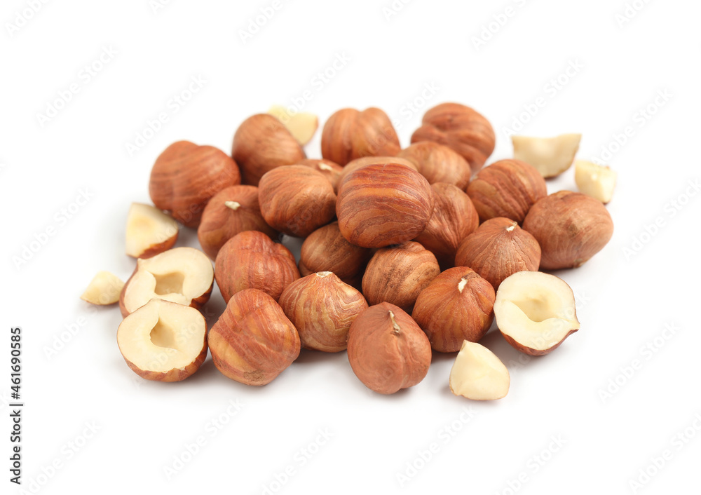 Heap of tasty hazelnuts on white background Heap of tasty hazelnuts on white background