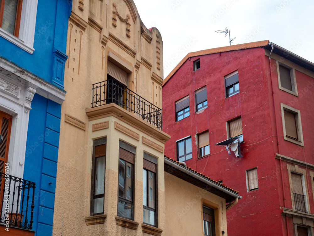 Urban planning and streets of Bilbao. Colorful buildings and houses with various shades. Modern and colorful architecture. Urban housing. Yellows, reds, blues and urban geometries and textures, Bilbao