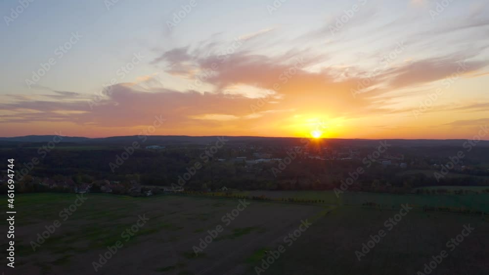 Aerial drone shot - a town in a rural area during golden sunset Aerial drone shot - a town in a rural area during golden sunset