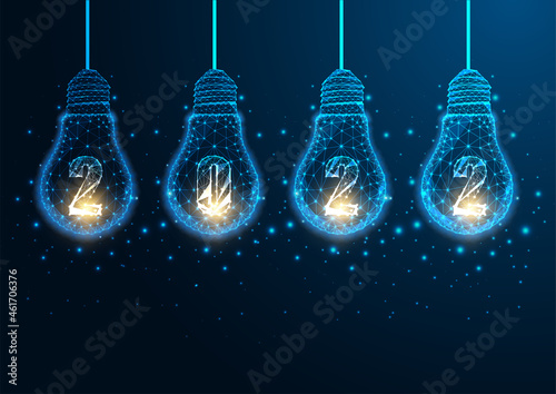 Futuristic Happy 2022 New Year hi tech concept with illuminated glowing low polygonal light bulbs