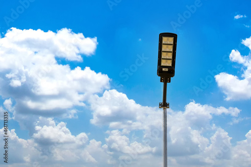 A modern street LED lighting pole. Urban electro-energy technologies. Poles on the road with LED light. Outdoor lighting strong LED lamp. 