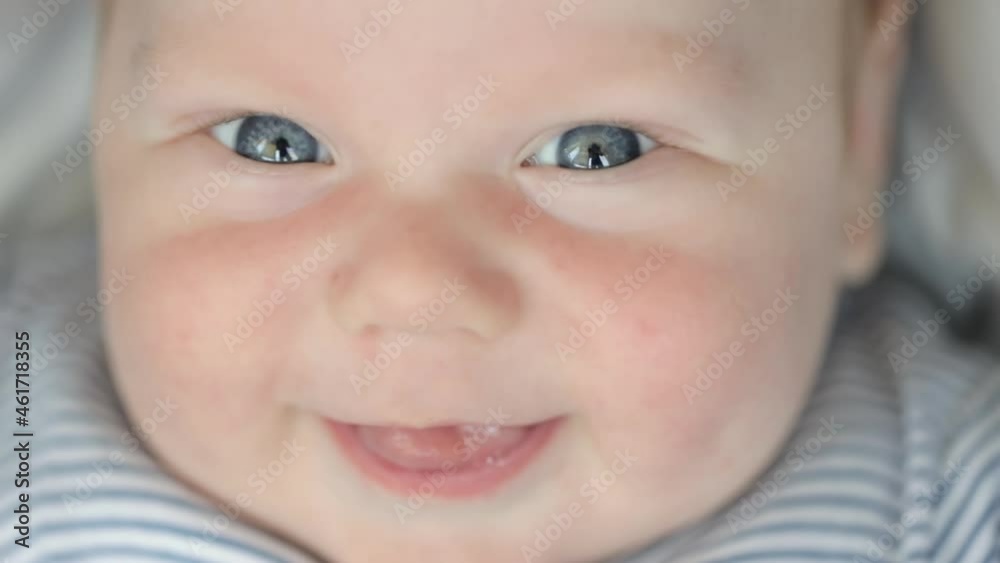 Happy smile of newborn baby boy, portrait Happy smile of newborn baby boy, portrait