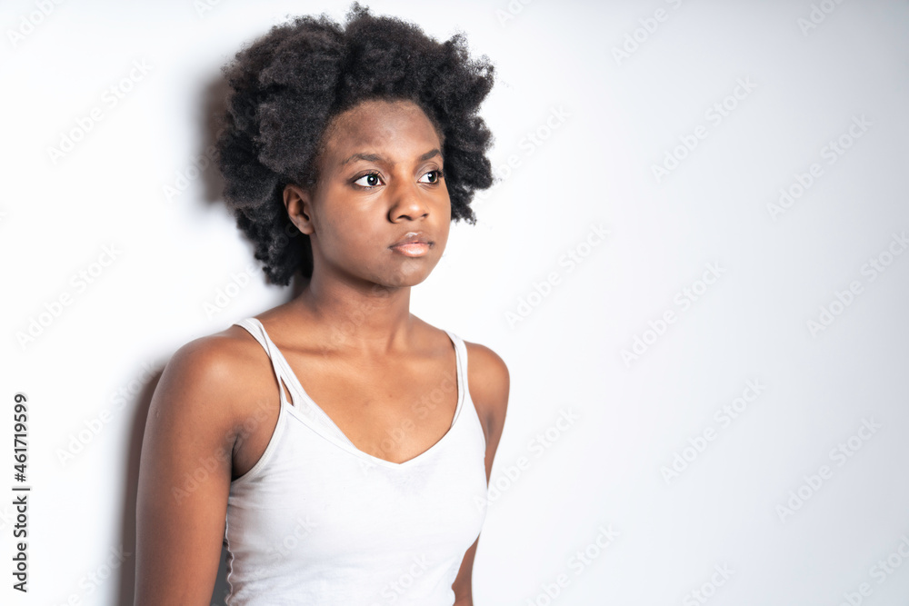 Young African Woman Isolated On White Background look no feeling Young African Woman Isolated On White Background look no feeling