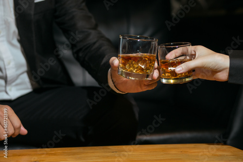 Businessmen in suits drinking  Celebrate whiskey