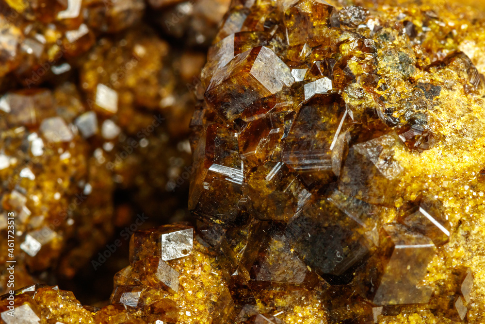 Macro mineral stone Garnet, Green Garnet, Epidote Grossular in the rock on a white background Macro mineral stone Garnet, Green Garnet, Epidote Grossular in the rock on a white background