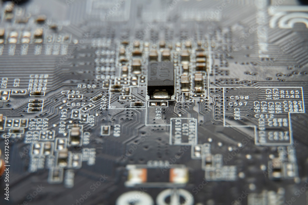 Closeup of computer technology. Photo of a motherboard with micro parts Closeup of computer technology. Photo of a motherboard with micro parts