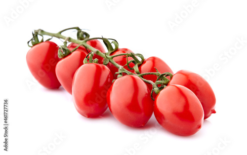 Ripe  red tomatoes isolated on a white background. Cherry tomatoes closeup.