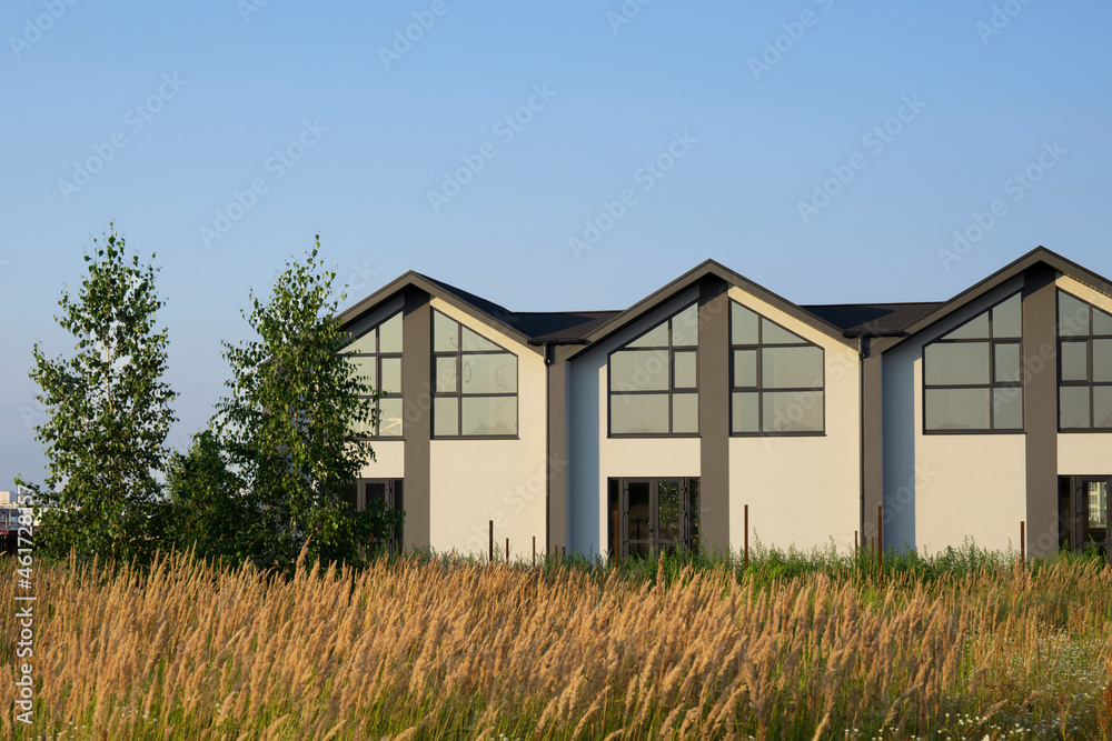 Modern town houses in a new residential complex. Modern town houses in a new residential complex.