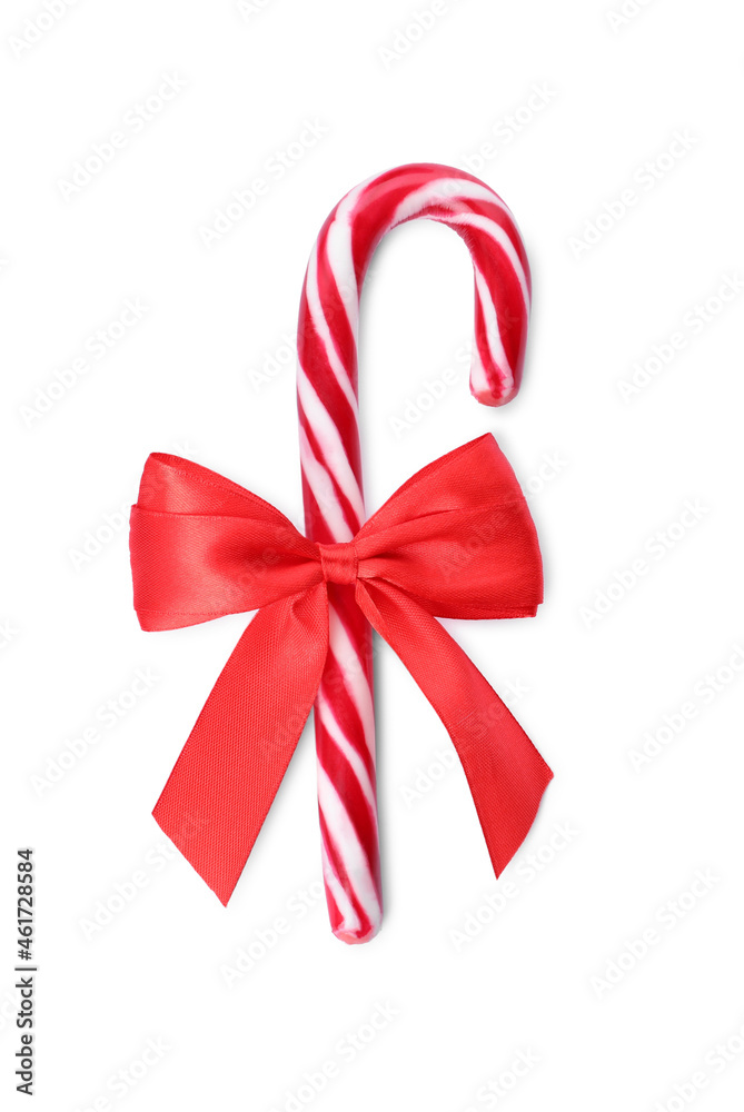 Sweet Christmas candy cane with red bow on white background, top view Sweet Christmas candy cane with red bow on white background, top view