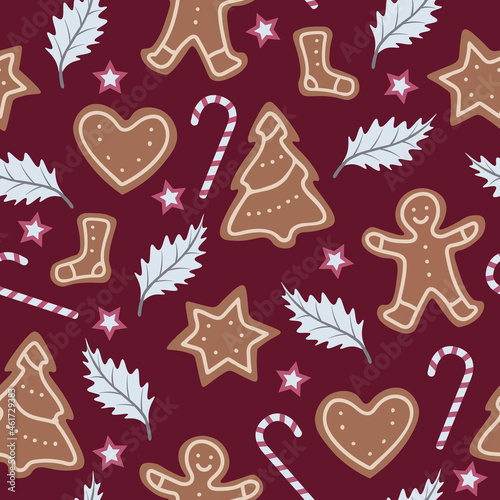 Christmas seamless pattern with candy canes, gingerbreads and leafs. Repetitive vector pattern design.