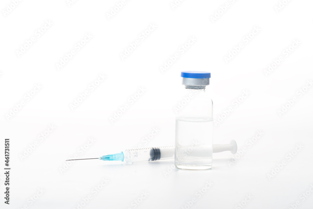 Syringes and glass bottles in white background Syringes and glass bottles in white background