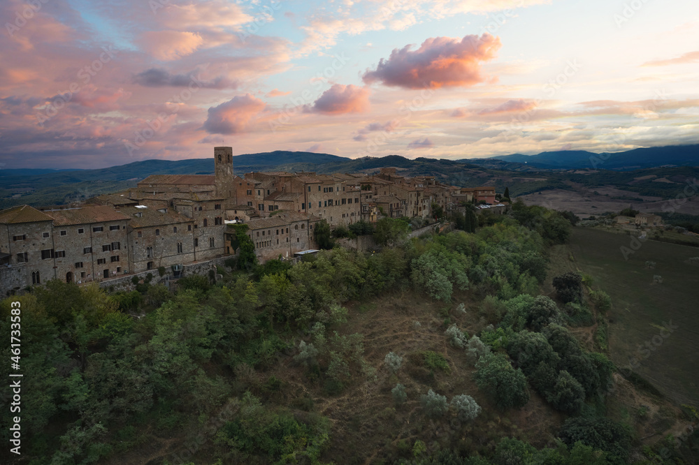 aerial view at sunset of the medieval town of casole d'elsa in Tuscany