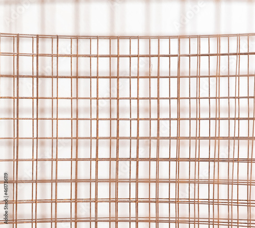 Rusty metal mesh as background.