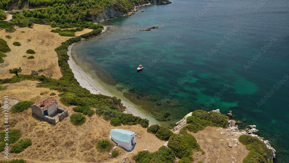 Aerial drone photo of beautiful sandy bay and picturesque small chapel of Agios Fokas in island of Skiros, Sporades, Greece