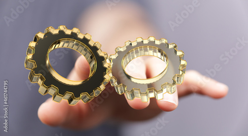 Cyborg hand holding a gear ...