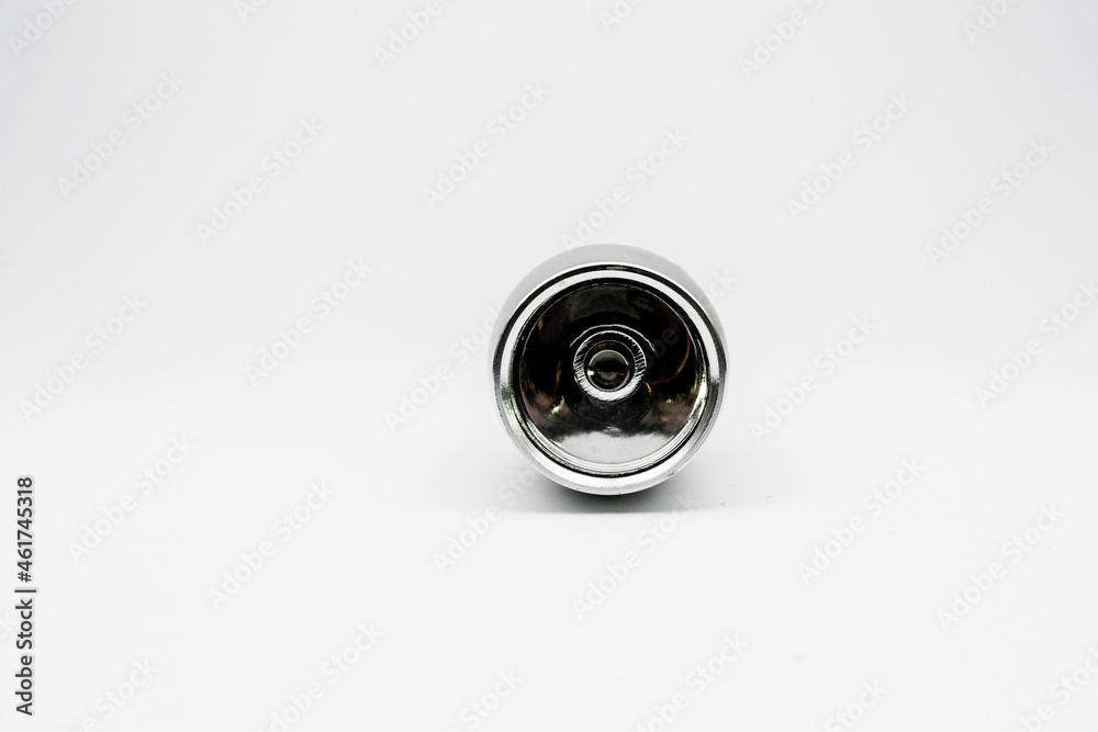 silver flashlight with isolated empty background