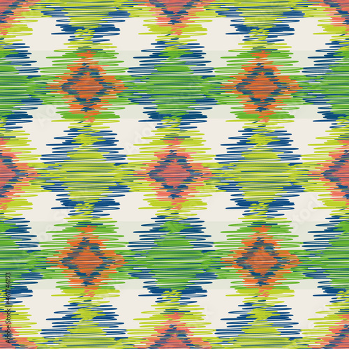 Shibori style ikat vector seamless vector pattern background. Scribbled diamond shapes backdrop in green, orange white. Weave effect repeat. Retro woven geometric all over print wellness, packaging