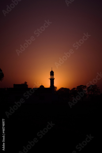 Mosque in village at sunset time