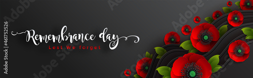 Remembrance day lest we forget. realistic red poppy flower international symbol of peace with paper cut art and craft style on color background.
