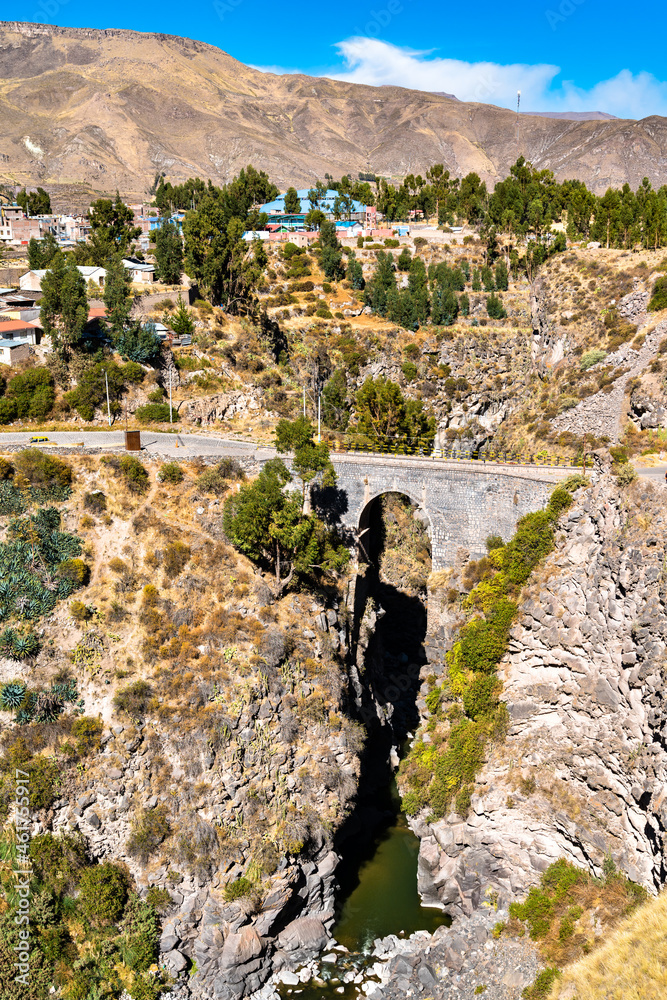 Naklejka premium The Inca Bridge across the Colca River at Chivay, Peru