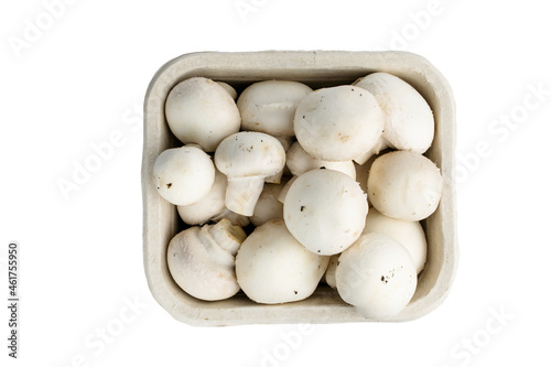 champignons mushrooms in cardboard pack, top view, isolatrd