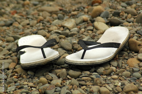 Thongs on the beach in New Zealand photo