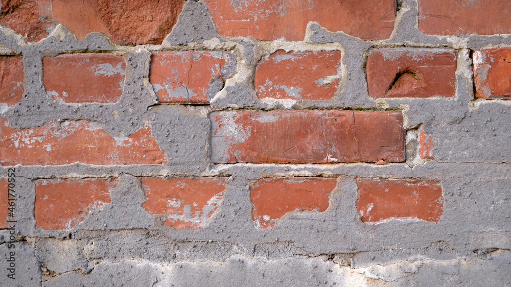 Fototapeta premium Old brick wall with peeling plaster, Brickwall Backdrop.