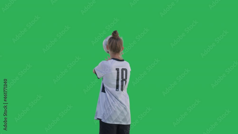 Close-up of girl soccer player performs tricks with the ball on a green screen background, Chroma Key. Young caucasian woman practicing football skills. 4K UHD slow motion RAW graded footage Close-up of girl soccer player performs tricks with the ball on a green screen background, Chroma Key. Young caucasian woman practicing football skills. 4K UHD slow motion RAW graded footage