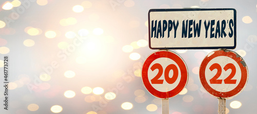 Wallpaper Mural 2022 new year greeting concept on road sign with blur bokeh background Torontodigital.ca