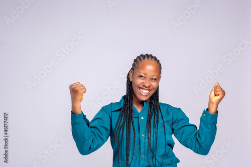 Fényképezés Smiling joyful young black nigerian brunette woman girl in posing isolated on white background studio portrait