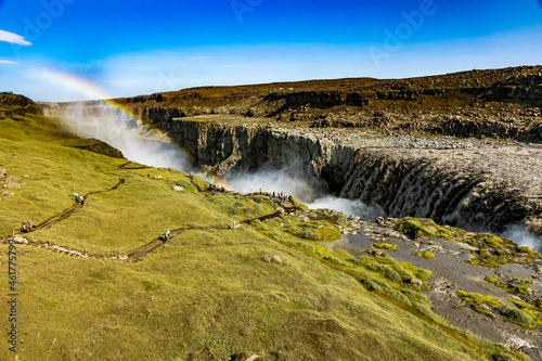 beautiful rainbow formation in Dettifoss waterfall in Iceland