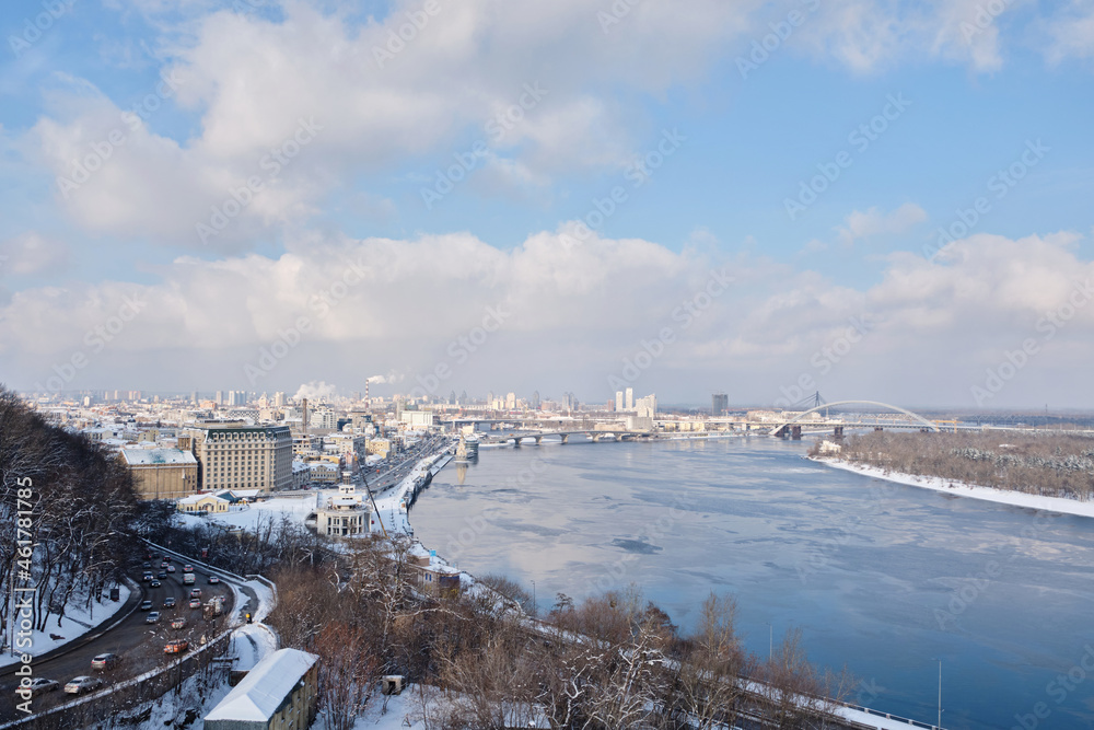 Fototapeta premium View of the Dnieper River from a glass bridge on a sunny winter day, Kiev