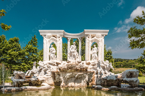 Fountain in Ravadinovo, with columns and Roman sculptures photo