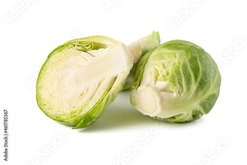 Brussels sprouts on a white background. Fresh small Brussels sprouts, cut in half, Brussels sprouts texture