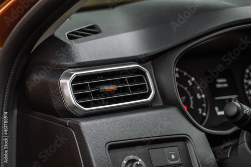 Car air conditioning close up view. The air conditioner flow inside the car. Detail interior of car. Air ducts.