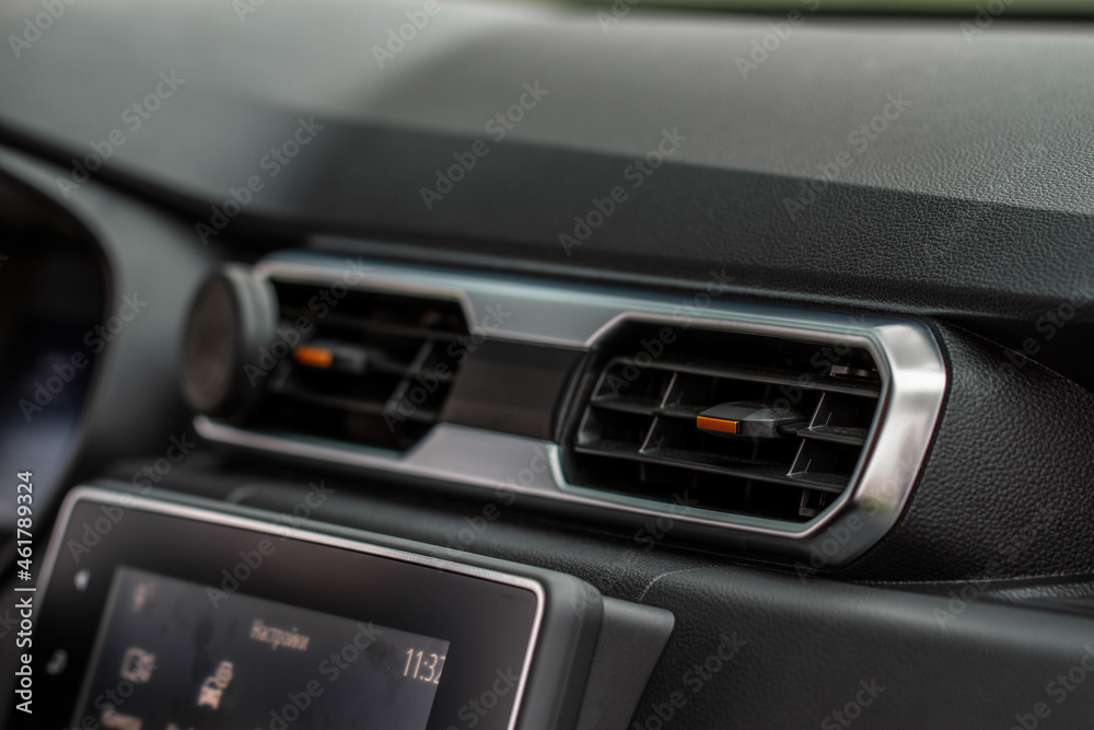 Car air conditioning system. Car air condition. Modern car interior detail.