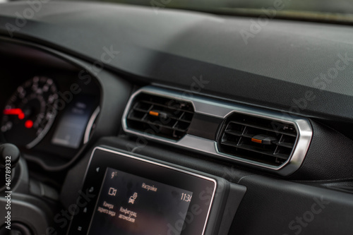 Car air conditioning system. Car air condition. Modern car interior detail. © Roman