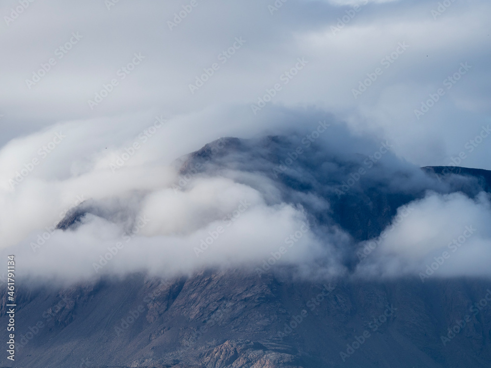 photos of mountains, glaciers, icebergs, and sea ice in the Canadian Arctic landscape. 