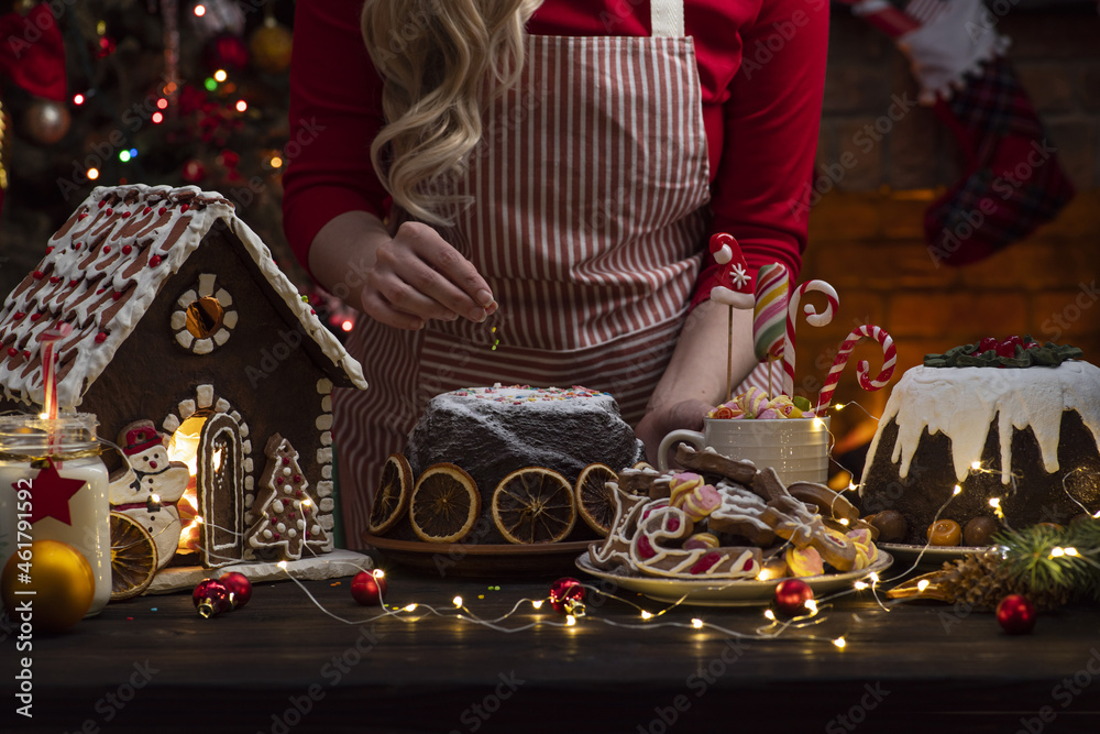 Fototapeta premium Christmas Eve Party Table. Fireplace and Christmas tree, treats, warmth, cozy family hearth
